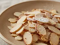 Almond flakes (for sprinkling)