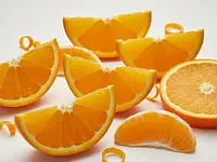 Fresh orange slices (for decoration, optional)