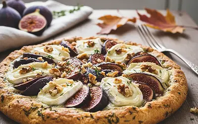 Autumn tart with figs, goat cheese, and walnuts on a thyme shortcrust base