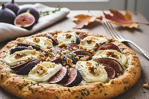 Autumn tart with figs, goat cheese, and walnuts on a thyme shortcrust base