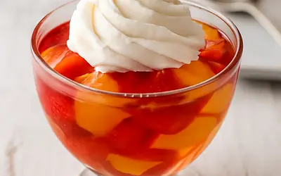 Fruit jelly with whipped cream